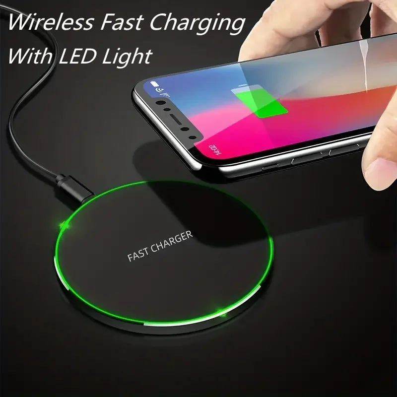 Wireless fast charging pad with LED light indicator on a dark surface, showing a smartphone being charged.