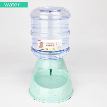 Pet water dispenser with clear container and green base on a white background