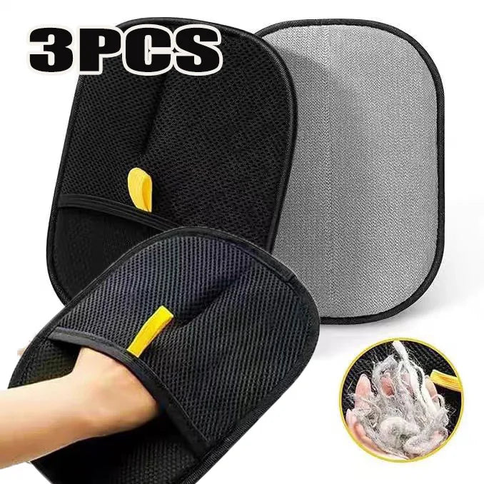Three black bath mitts with yellow accents on a white background, one showing use on a hand.