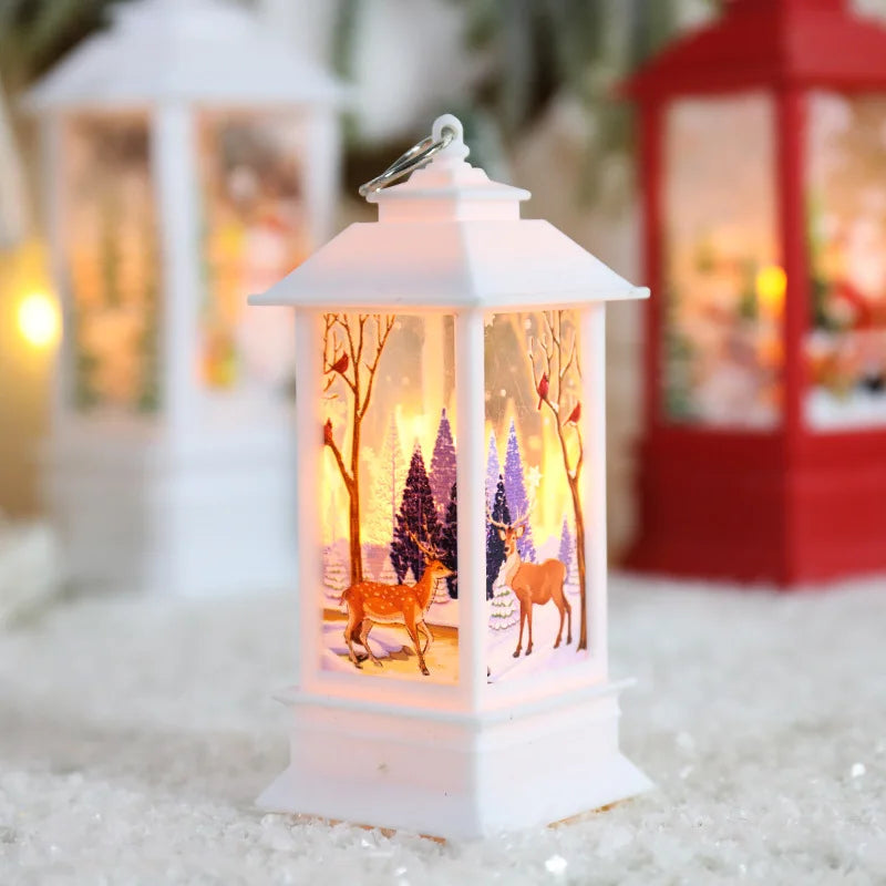 Decorative lantern with a winter scene featuring deer and trees, illuminated in a snowy setting.