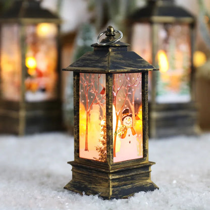Decorative lantern with winter scene on a snowy surface