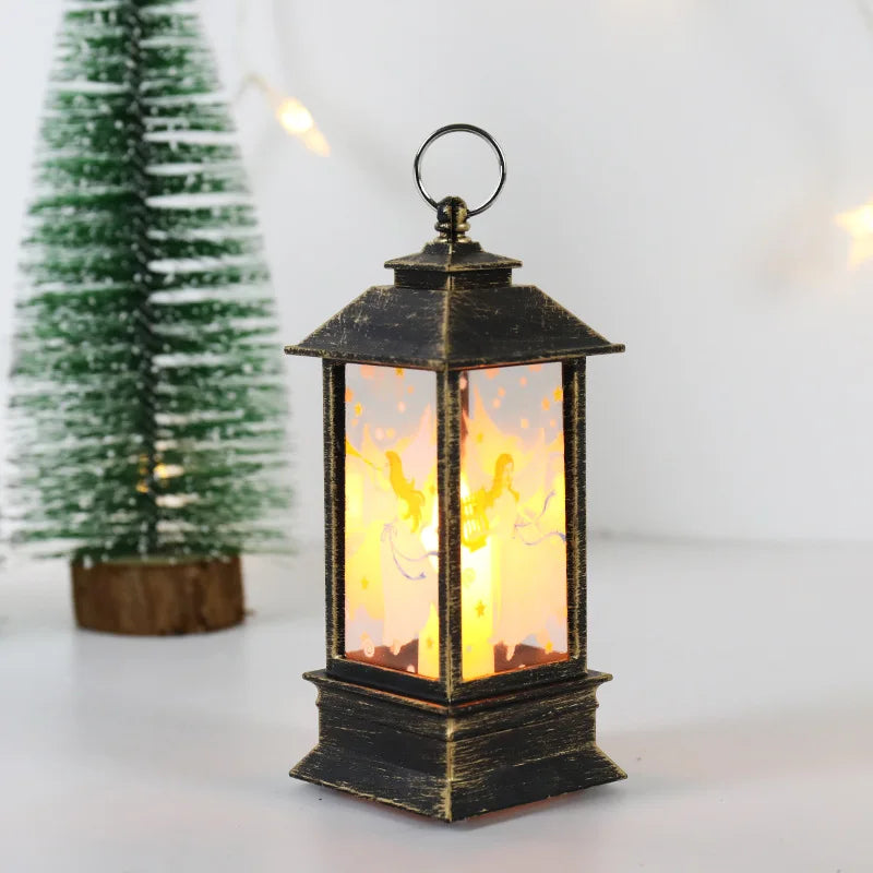 Decorative lantern with flame effect on a white surface with a small Christmas tree in the background.