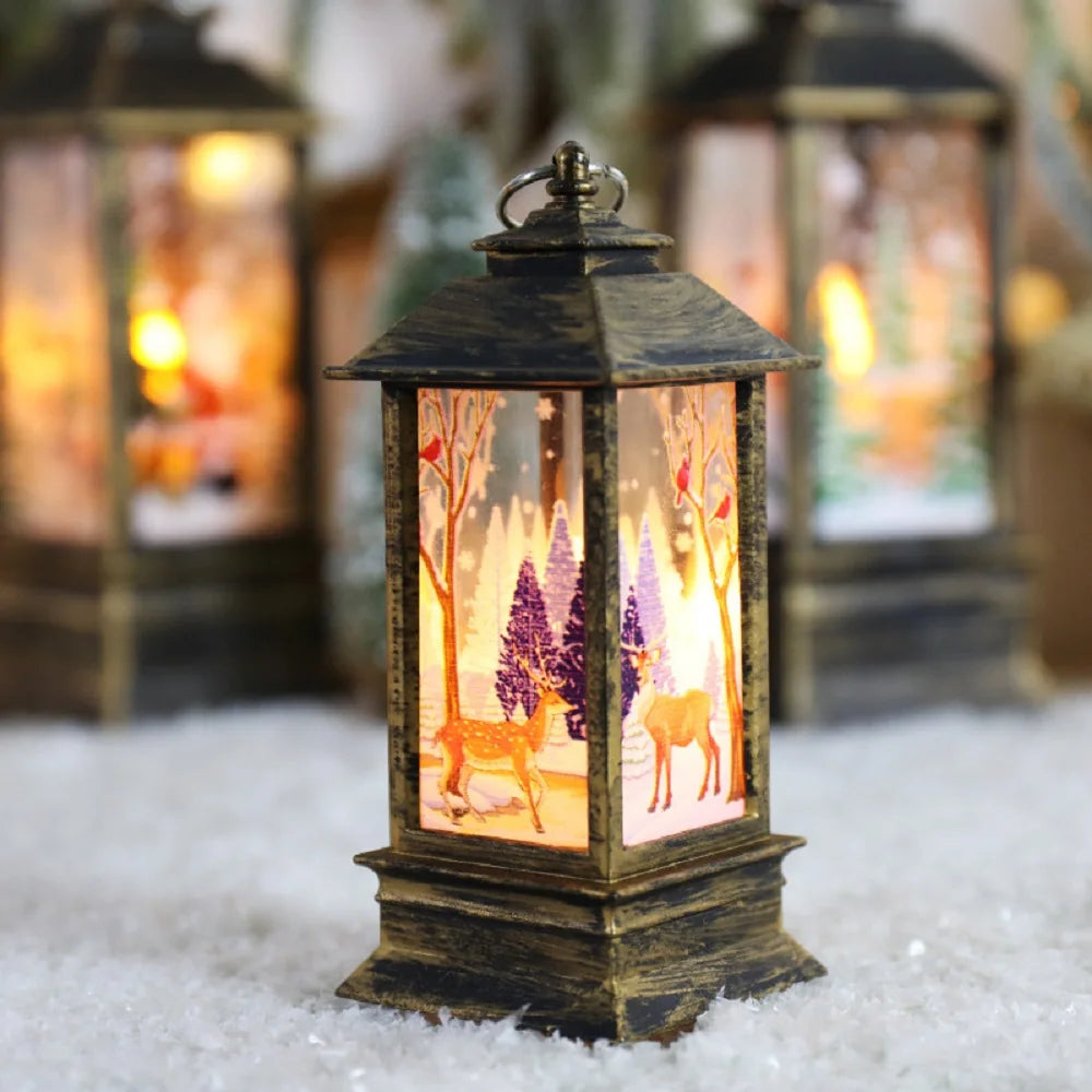 Decorative lantern with a winter scene of deer and trees on a snowy ground.