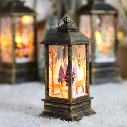 Decorative lantern with a winter scene of deer and trees on a snowy ground.